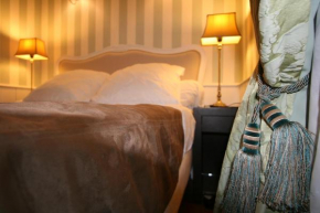 Отель Paris Interiors Rentals - Le Marais Archives 2 Bdr  Париж